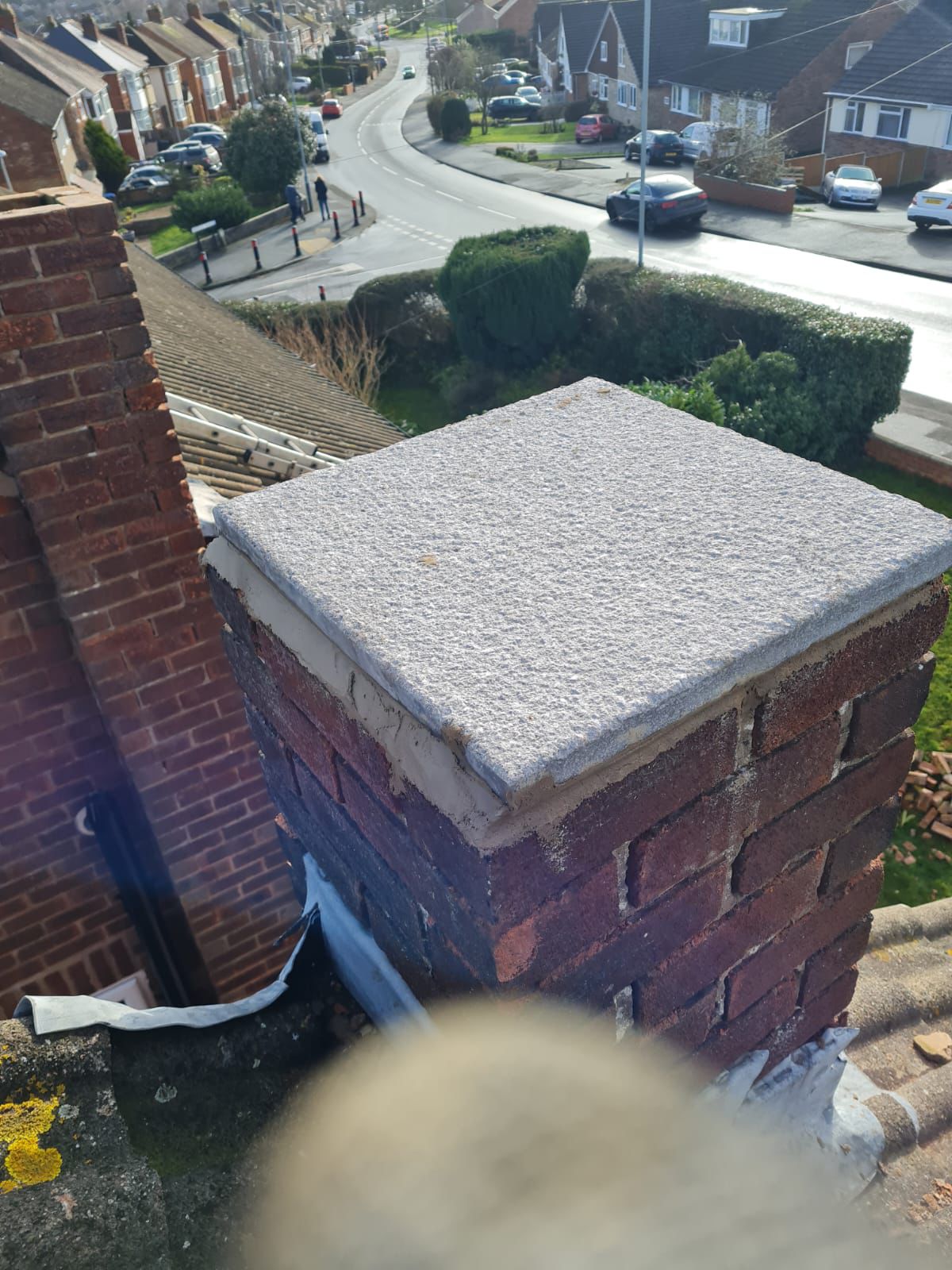 Completed roofing project on terraced property