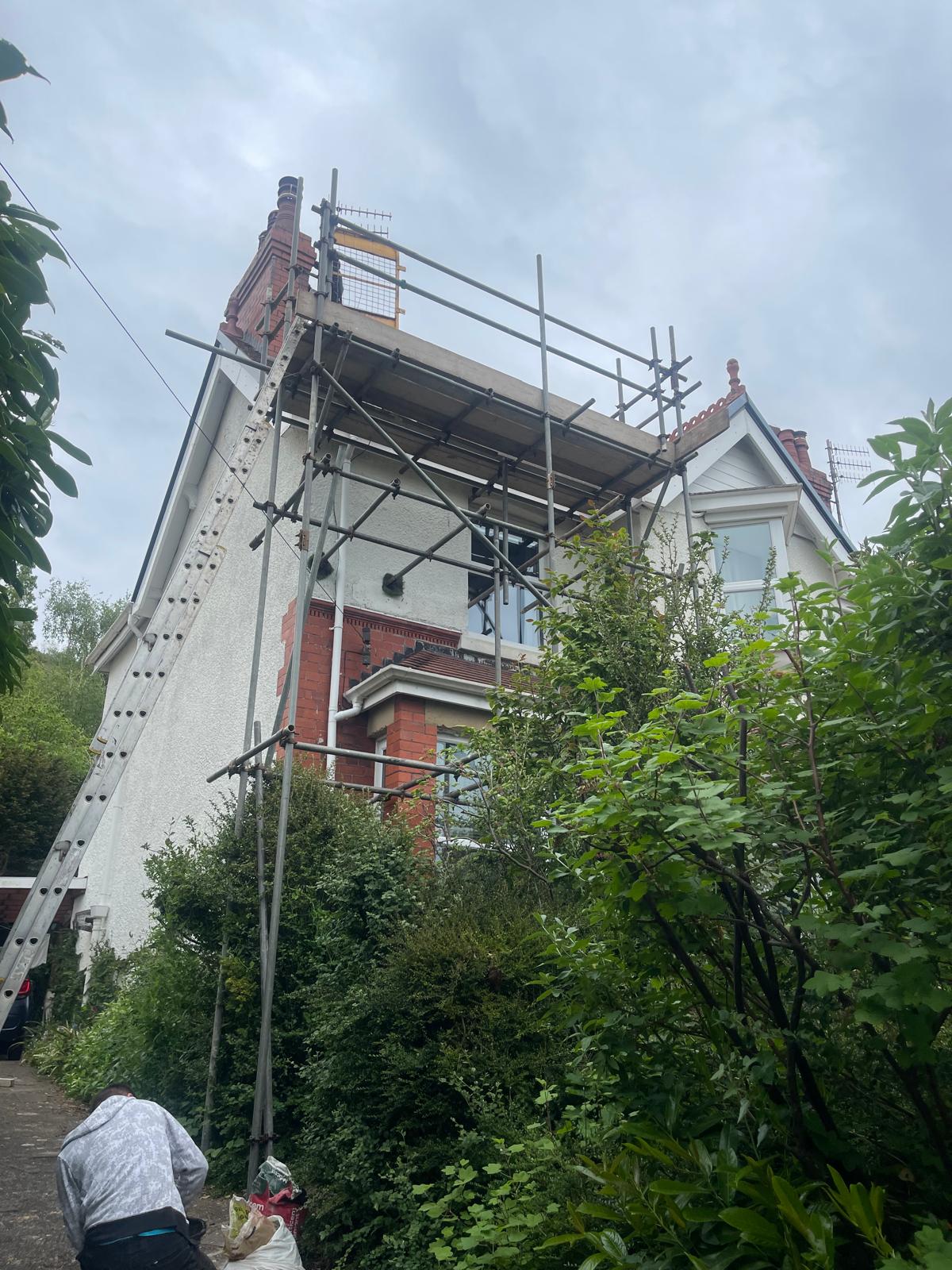 Scaffolding erected for chimney and roof repair work