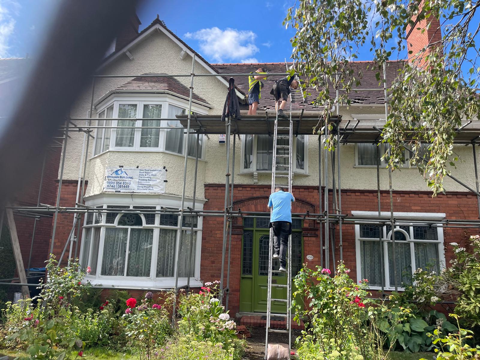 Full roof renovation with scaffolding on a period semi-detached home in Liverpool